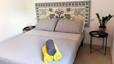 Letto o letti in una camera di Casa Stewart - Levante