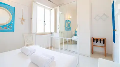 Letto o letti in una camera di Casa Dei Catalani- Rustic Charm