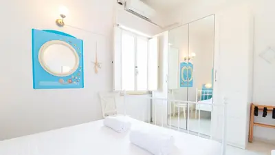 Letto o letti in una camera di Casa Dei Catalani- Rustic Charm