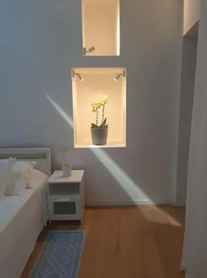 Letto o letti in una camera di La Bella Vita