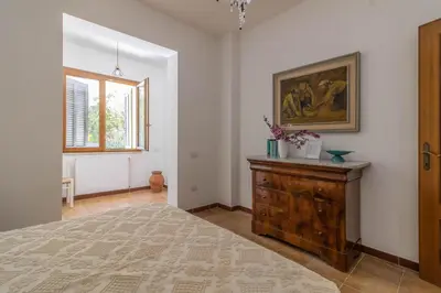Letto o letti in una camera di Casa Masina, appartamento a 500 mt dal mare