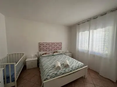 Letto o letti in una camera di CannonHouse - La Pavoncella Rosa