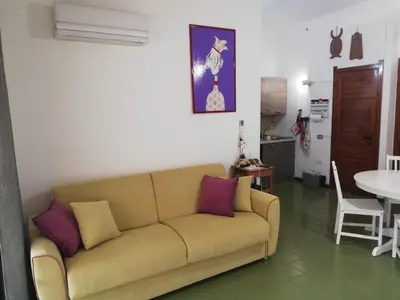 Cucina o angolo cottura di Roro's house - Villa with terrace 100m from the beach - Pinus Village