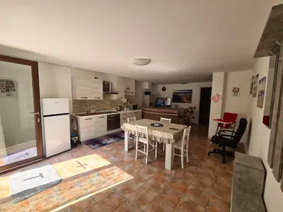 Cucina o angolo cottura di STELLA MARINA, Appartamento a 450 mt dalla costa del Mar di Sardegna