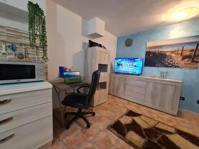 TV o dispositivi per l'intrattenimento presso STELLA MARINA, Appartamento a 450 mt dalla costa del Mar di Sardegna