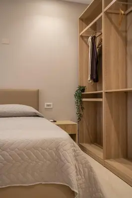 Letto o letti in una camera di L'OLEANDRO Room's - Suite & Spa da Giuseppe