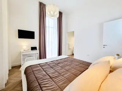 Letto o letti in una camera di Glamour Suite by Accomodo