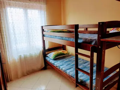Letto o letti in una camera di Deliziosa casetta in centro a 10 min dal mare