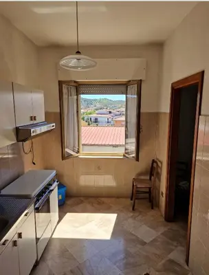Cucina o angolo cottura di Apartment Piras&Tascedda Ampio Appartamento Vicino al Centro