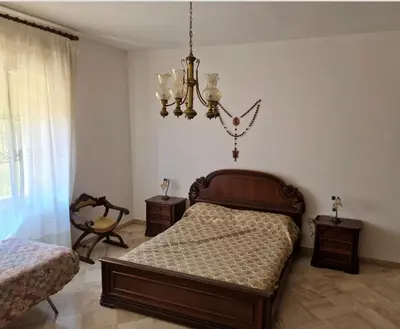 Letto o letti in una camera di Apartment Piras&Tascedda Ampio Appartamento Vicino al Centro