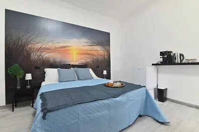 Letto o letti in una camera di IzzHome Cozy Room