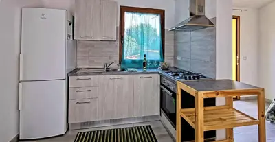 Cucina o angolo cottura di Nuovo alloggio ampia veranda free wi-fi