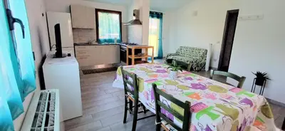 Letto o letti in una camera di Nuovo alloggio ampia veranda free wi-fi