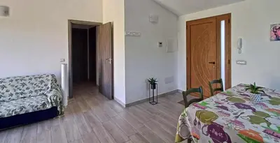 Letto o letti in una camera di Nuovo alloggio ampia veranda free wi-fi