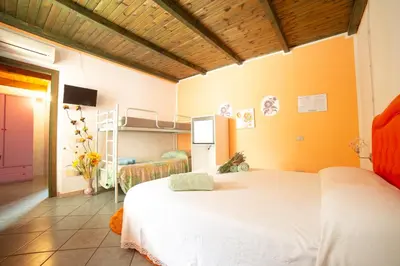 Letto o letti in una camera di Sa Pramma