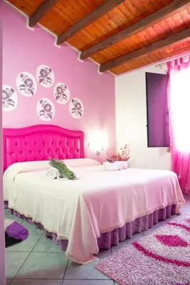 Letto o letti in una camera di Sa Pramma