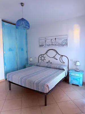 Letto o letti in una camera di CALYPSO Apartment